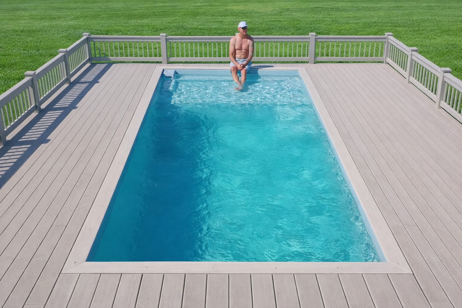 Container pool with deck and railing