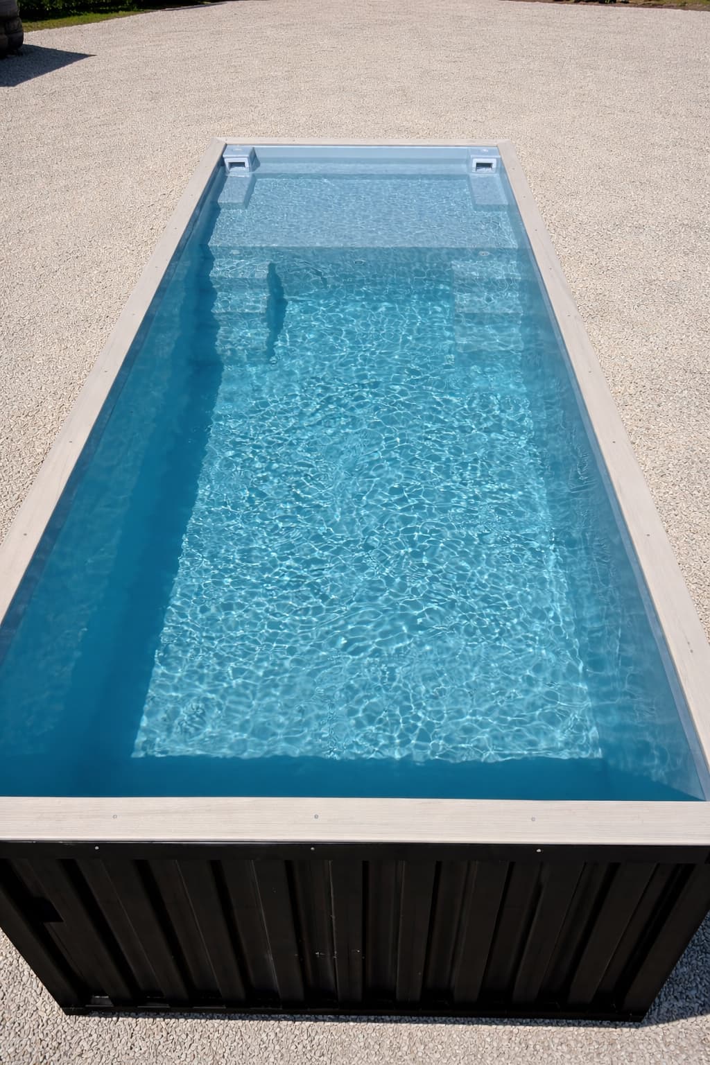 20ft container pool filled with water — angle view